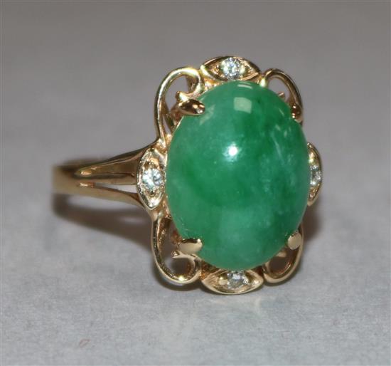A 14ct gold jade and diamond set dress ring, size O.